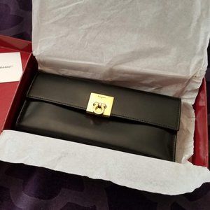 Black leather Salvatore Ferragamo wallet or clutch